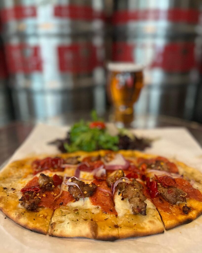 Lookin’ to spice up your lunch break? Come grab a Calabrese flatbread! Served ti